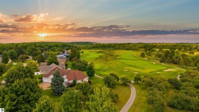 Experience luxury living on the 11th fairway of The Bear Golf on Grand Traverse Resort and Spa in Michigan - for sale on GolfHomes.com, golf home, golf lot