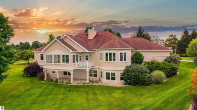 Experience luxury living on the 11th fairway of The Bear Golf on Grand Traverse Resort and Spa in Michigan - for sale on GolfHomes.com, golf home, golf lot
