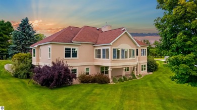 Experience luxury living on the 11th fairway of The Bear Golf on Grand Traverse Resort and Spa in Michigan - for sale on GolfHomes.com, golf home, golf lot