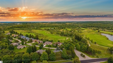Experience luxury living on the 11th fairway of The Bear Golf on Grand Traverse Resort and Spa in Michigan - for sale on GolfHomes.com, golf home, golf lot