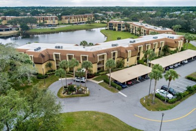 Beautifully appointed and renovated throughout in this 2 bedroom on BallenIsles Golf and Country Club in Florida - for sale on GolfHomes.com, golf home, golf lot