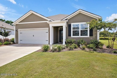 Easy living in this one level home with lawncare included! This on Cape Fear National At Brunswick Forest in North Carolina - for sale on GolfHomes.com, golf home, golf lot