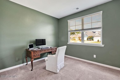 Easy living in this one level home with lawncare included! This on Cape Fear National At Brunswick Forest in North Carolina - for sale on GolfHomes.com, golf home, golf lot