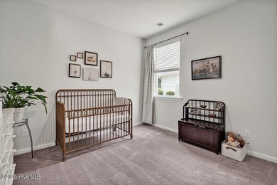 Easy living in this one level home with lawncare included! This on Cape Fear National At Brunswick Forest in North Carolina - for sale on GolfHomes.com, golf home, golf lot