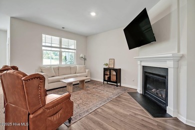 Easy living in this one level home with lawncare included! This on Cape Fear National At Brunswick Forest in North Carolina - for sale on GolfHomes.com, golf home, golf lot