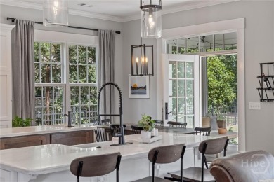 Experience luxury living in this stunning custom-built home on Savannah Quarters Country Club in Georgia - for sale on GolfHomes.com, golf home, golf lot