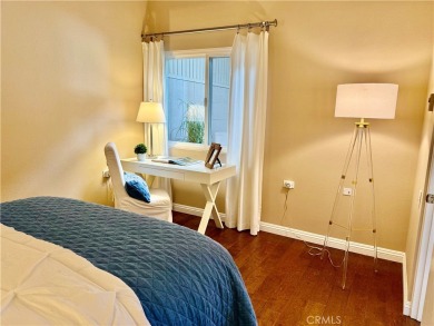 This elegant 2 bedroom one bathroom home is located in a serene on Leisure World Seal Beach Golf Course in California - for sale on GolfHomes.com, golf home, golf lot