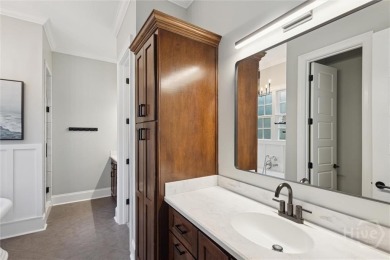 Experience luxury living in this stunning custom-built home on Savannah Quarters Country Club in Georgia - for sale on GolfHomes.com, golf home, golf lot