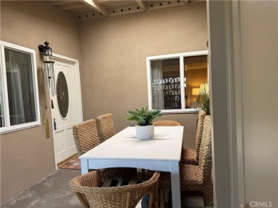 This elegant 2 bedroom one bathroom home is located in a serene on Leisure World Seal Beach Golf Course in California - for sale on GolfHomes.com, golf home, golf lot