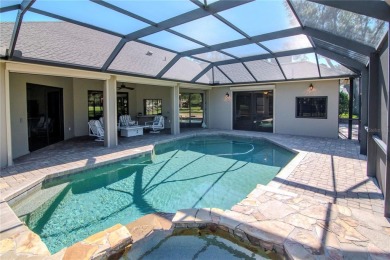 Beautiful updated 4 bedroom POOL home located in the prestigious on River Hills Country Club in Florida - for sale on GolfHomes.com, golf home, golf lot