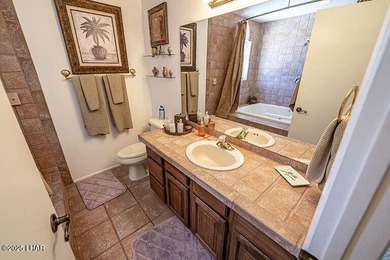 On the fairway! Welcome home to this iconic Havasu property in on London Bridge Golf Course in Arizona - for sale on GolfHomes.com, golf home, golf lot