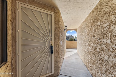 Discover one of Lake Havasu's best values in condo living! on London Bridge Golf Course in Arizona - for sale on GolfHomes.com, golf home, golf lot