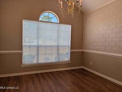 This home is located within a highly walkable community on Diamondhead Country Club in Mississippi - for sale on GolfHomes.com, golf home, golf lot