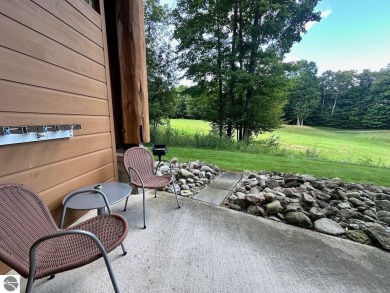 Fully furnished corner unit at the Lodge at Cedar River Village on Cedar River Golf Course in Michigan - for sale on GolfHomes.com, golf home, golf lot