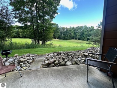 Fully furnished corner unit at the Lodge at Cedar River Village on Cedar River Golf Course in Michigan - for sale on GolfHomes.com, golf home, golf lot