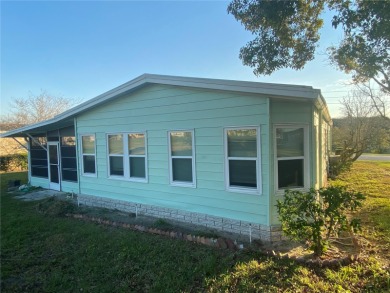 Spacious Home on the 18th hole of Zellwood Country Club and on Zellwood Station Country Club in Florida - for sale on GolfHomes.com, golf home, golf lot