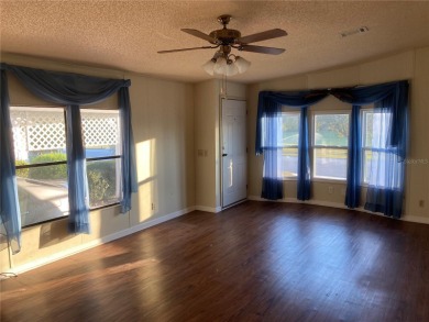 Spacious Home on the 18th hole of Zellwood Country Club and on Zellwood Station Country Club in Florida - for sale on GolfHomes.com, golf home, golf lot