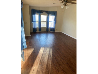 Spacious Home on the 18th hole of Zellwood Country Club and on Zellwood Station Country Club in Florida - for sale on GolfHomes.com, golf home, golf lot