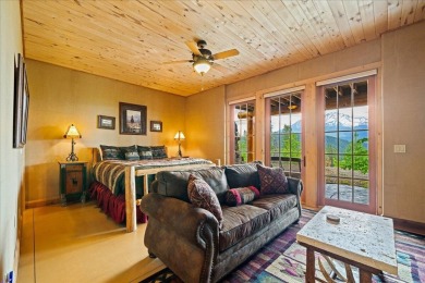 Sentinel Retreat rises boldly from its ridge-top setting above on Mount Shasta Resort in California - for sale on GolfHomes.com, golf home, golf lot