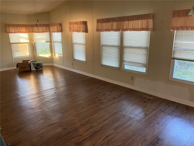 Spacious Home on the 18th hole of Zellwood Country Club and on Zellwood Station Country Club in Florida - for sale on GolfHomes.com, golf home, golf lot