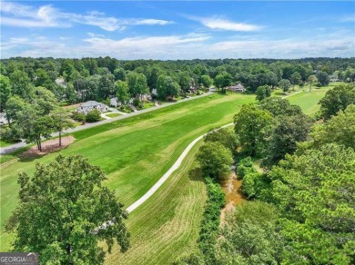 This Beautiful Custom Home with unique floor plan is situated on on Indian Hills Country Club in Georgia - for sale on GolfHomes.com, golf home, golf lot