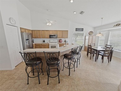Well-maintained furnished 3-bedroom, 2-bath home with no rear on Heritage Pines Country Club in Florida - for sale on GolfHomes.com, golf home, golf lot