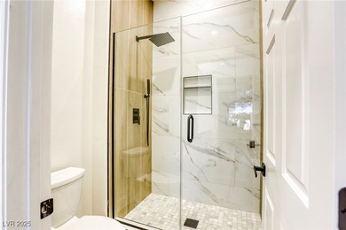 GOLF COURSE + MOUNTAIN VIEWS! Stunning single-story townhome on Highland Falls Golf Club in Nevada - for sale on GolfHomes.com, golf home, golf lot