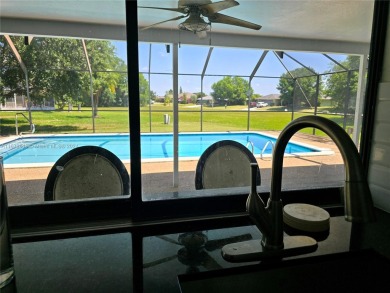 Great location!, spacious 3 bedroom, 2 bath pool home. Located on Spring Lake Golf Resort in Florida - for sale on GolfHomes.com, golf home, golf lot