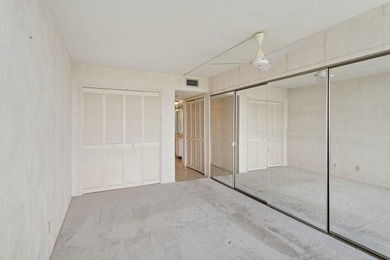 Located on the prestigious Oaks Clubhouse Drive in Palm-Aire on Palm-Aire Country Club and Resort - Palms in Florida - for sale on GolfHomes.com, golf home, golf lot