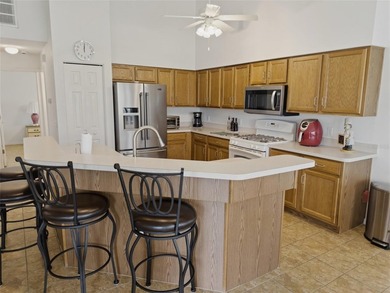 Well-maintained furnished 3-bedroom, 2-bath home with no rear on Heritage Pines Country Club in Florida - for sale on GolfHomes.com, golf home, golf lot