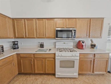 Well-maintained furnished 3-bedroom, 2-bath home with no rear on Heritage Pines Country Club in Florida - for sale on GolfHomes.com, golf home, golf lot