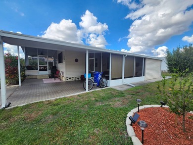 Beautiful FURNISHED 2/2 with a Chef's kitchen is ready for YOU! on Grasslands Golf and Country Club in Florida - for sale on GolfHomes.com, golf home, golf lot