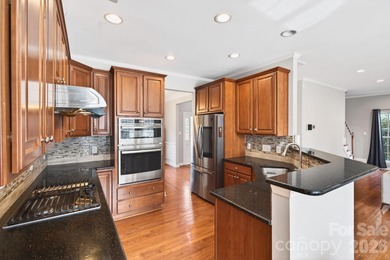 Welcome to 1458 Bedlington Drive NW, a spacious and beautifully on Highland Creek Golf Club in North Carolina - for sale on GolfHomes.com, golf home, golf lot