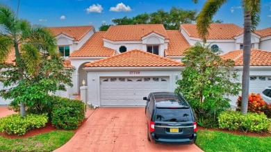 This spacious 4 bedroom, 2 and a half bath townhome is situated on The Boca Country Club in Florida - for sale on GolfHomes.com, golf home, golf lot