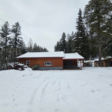 2 Homes on 1 Acre in Columbia Falls.  The Main house is vacant on Meadow Lake Golf Resort in Montana - for sale on GolfHomes.com, golf home, golf lot