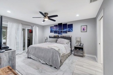 This spacious 4 bedroom, 2 and a half bath townhome is situated on The Boca Country Club in Florida - for sale on GolfHomes.com, golf home, golf lot