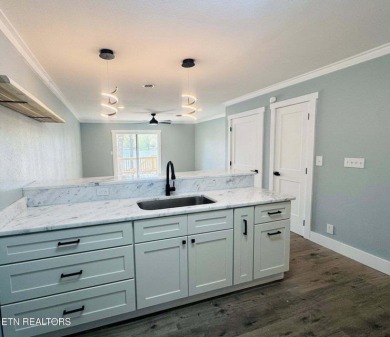 Do you crave new friendships and love being where the action on Stonehenge Golf Course in Tennessee - for sale on GolfHomes.com, golf home, golf lot