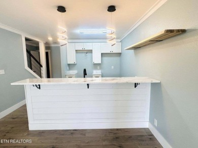 Do you crave new friendships and love being where the action on Stonehenge Golf Course in Tennessee - for sale on GolfHomes.com, golf home, golf lot