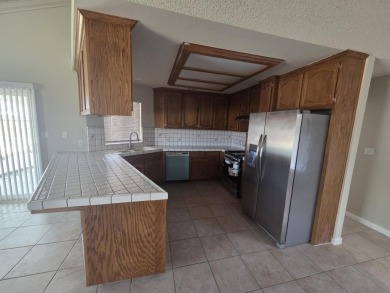 Remodeled 3 bedroom 2 bathroom house, new flooring throughout on Tierra Del Sol Golf Course in California - for sale on GolfHomes.com, golf home, golf lot