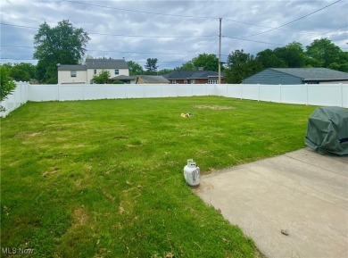 A charming two-story home nestled in a highly desirable on Trumbull Country Club in Ohio - for sale on GolfHomes.com, golf home, golf lot