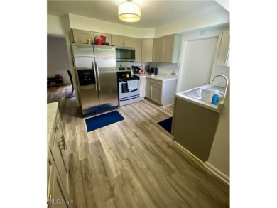 A charming two-story home nestled in a highly desirable on Trumbull Country Club in Ohio - for sale on GolfHomes.com, golf home, golf lot