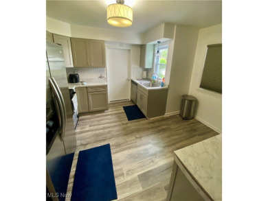 A charming two-story home nestled in a highly desirable on Trumbull Country Club in Ohio - for sale on GolfHomes.com, golf home, golf lot