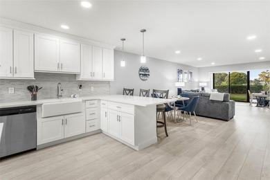 Your private Boca Lago retreat awaits! Exquisitely remodeled on Boca Lago Golf and Country Club in Florida - for sale on GolfHomes.com, golf home, golf lot