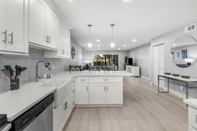 Your private Boca Lago retreat awaits! Exquisitely remodeled on Boca Lago Golf and Country Club in Florida - for sale on GolfHomes.com, golf home, golf lot