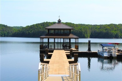 Lakeview Cottage Retreat on Wooded Lot Overlooking a Flowing on The Highlands Course at Lake Arrowhead in Georgia - for sale on GolfHomes.com, golf home, golf lot