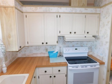 This charming, fully furnished home is perfect for both relaxing on Betmar Acres Golf Club in Florida - for sale on GolfHomes.com, golf home, golf lot