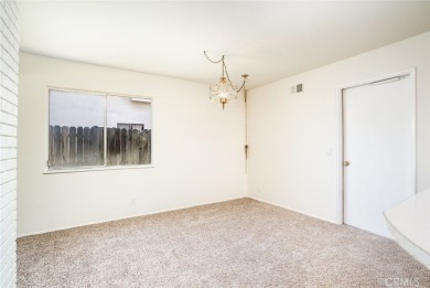This lovely beach home resides in the center of the Huntington on Meadowlark Golf Club in California - for sale on GolfHomes.com, golf home, golf lot
