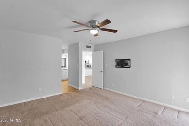 Welcome home to effortless living in Fountain of the Sun, a on Fountain of the Sun Country Club in Arizona - for sale on GolfHomes.com, golf home, golf lot