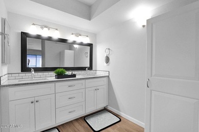 Welcome home to effortless living in Fountain of the Sun, a on Fountain of the Sun Country Club in Arizona - for sale on GolfHomes.com, golf home, golf lot