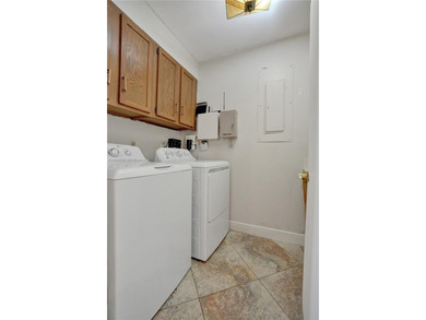 Elegant 2-bedroom, 2-bath residence with a 2-car garage, ideally on Jonathans Landing Golf Club in Florida - for sale on GolfHomes.com, golf home, golf lot